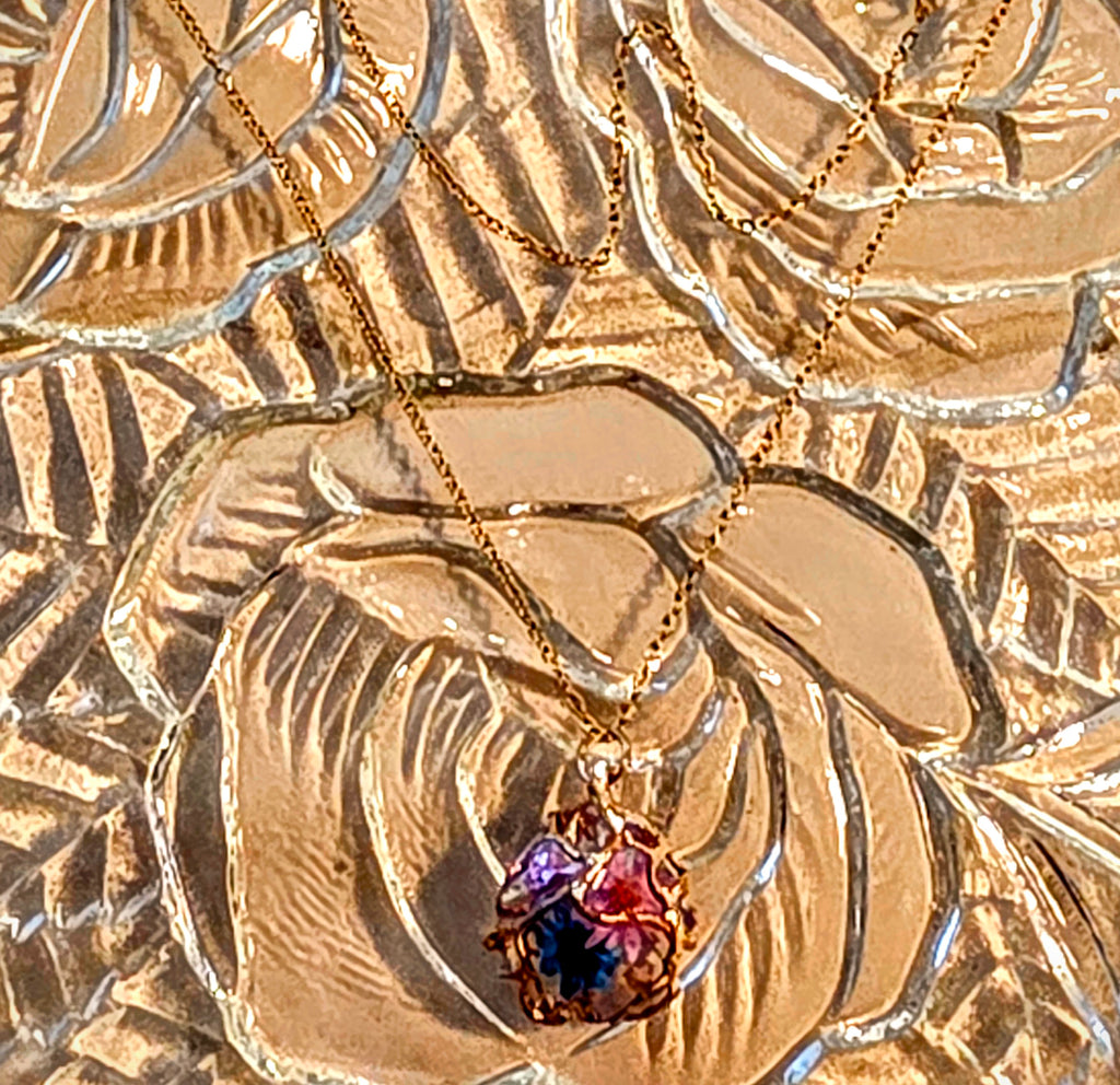 Lovely Necklace with Tiny Dried Resined Flowers, Encased in a Golden Web. Tarnish Resistant